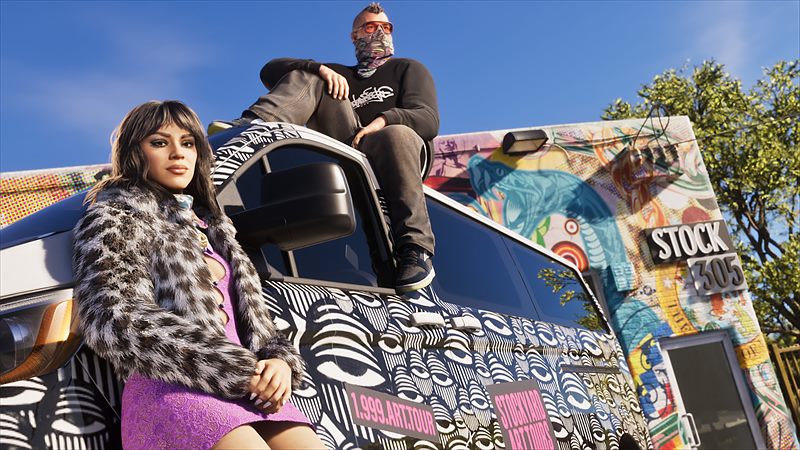 Un groupe pose sur un camion graffé aux couleurs de Stock 305